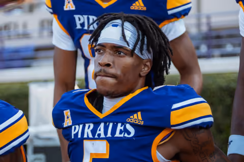 Football player in a Pirates jersey, photographed by GKeyPhoto
